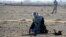Security personnel clear mines from a field in Afghanistan, which is one of the most heavily mined countries in the world. (file photo)