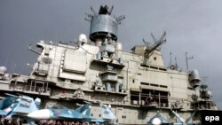 Российский авианосец в порту Тартус (архивное фото).

