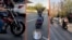 Iranian Biker Women Fight For Right To Ride On Tehran's Streets GRAB 1