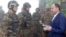 Armenia - Defense Minister Seyran Ohanian (R) awards soldiers on frontline duty.