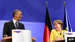 Барак Абама і Ангела Мэркель падчас прэсавай канфэрэнцыі ў Гановэры 24 красавіка 2015 году.