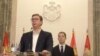 Serbian President Aleksandar Vucic (left) speaks to reporters in Belgarde as Marko Djuric, director of the Serbian government's Kosovo office, looks on in February 2019.