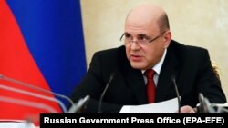 Russian Prime Minister Mikhail Mishustin attends a government meeting in Moscow on March 20.