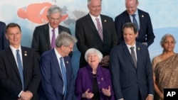 U.S. Treasury Secretary Janet Yellen (center) reacts prior to a group photo session of G7 finance ministers and central bank governors in Niigata, Japan, on May 12, 2023.