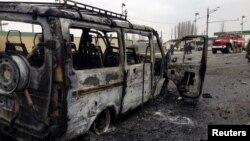 Жемикентте жарылған көліктің қалдығы. Дағыстан, 15  ақпан 2016 жыл. 