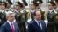 Президент Армении Серж Саргсян (слева) и его французский коллега Франсуа Олланд во время церемонии встречи президента Франции в ереванском аэропорту «Звартноц», Ереван, 12 мая 2014 г. 