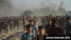 Գազայի հատված - Պաղեստինցիները շտապում են մարդասիրական օգնություն ստանալու, հունիս, 2025թ.