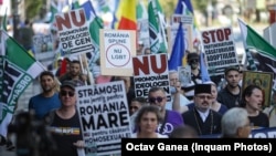 People took to the streets to protest against LGBT rights ahead of Pride celebrations in Bucharest in August 2021.