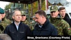 Марцін Кервіньскі (у цэнтры)