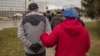WATCH: Protesters In Belarusian City Meet Regional Official, Call For Better Work Conditions