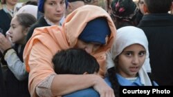 Qırımtatar sürgünligi aqqında ikâye etken «Haytarma» filminiñ levhaları. Nümüneviy fotoresim