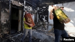 کنیسه‌ای که در شهر لود به آتش کشیده شده است