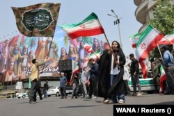 Антиизраильская манифестация в Тегеране после израильских ударов. 13 июня 2025 года