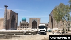 Workers at the construction site for a new amphitheater at the Registan complex in Samarkand.