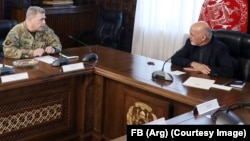 U.S. General Mark Milley (left) meets with Afghan President Ashraf Ghani on January 3.
