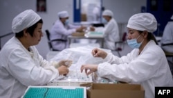 Չինացի գիտնականները Biopharma ընկերությունում փորձում են կորոնավիրուսի դեմ վակցինա ստեղծել, Շենյան, 9 հունիսի, 2020թ.