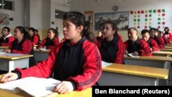 Синҗанның Кашгар шәһәрендә мәҗбүри тәрбия үзәге. (Архив фотосы)