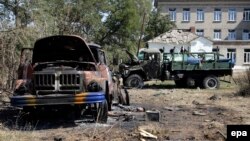 Пошкоджена техніка українських військових в Іловайську, архівне фото 