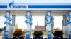 Russia -- Vehicles are seen at a gas filling station, owned by Gazprom Transgaz Stavropol, with the company logo of Russian natural gas producer Gazprom seen on the station, in Stavropol, October 9, 2013