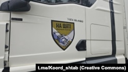 Аўтамабіль, на якім перавозяць целы загінулых украінцаў. Ілюстрацыйнае фота