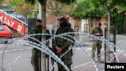 Members of the NATO-led KFOR peacekeeping force stand guard in Zvecan, Kosovo, on June 2. 