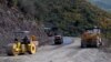 Armenia -- Workers refurbish a road in Syunik region.