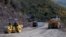 Armenia -- Workers refurbish a road in Syunik region.